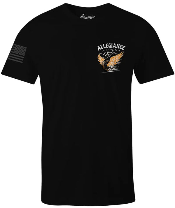 Black Wheelin' Tee with small front chest burnout graphic and American flag sleeve print.